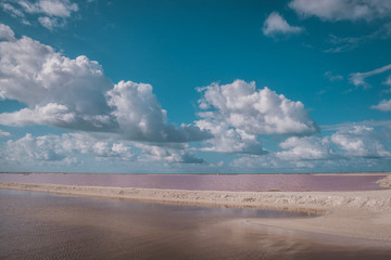 Las Coloradas, salt pink lagoon, beautiful pink water and clear blue sky near Rio Lagartos, Yucatan, Mexico