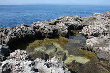 The Island Of Menorca. Recess with sea water over time with here will only be salt.