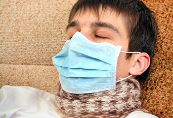 Young Man in Flu Mask