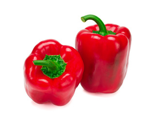 Two red sweet peppers isolated on white background