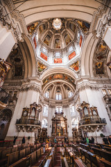 Fototapeta na wymiar Salzburg Cathedral or Salzburger Dom is the baroque roman catholic church with colorfill painted ceiling in Salzburg, Austria.