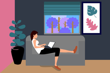 The woman relaxed work on the sofa.She is working from home.