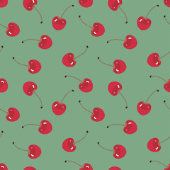 seamless pattern with the red cherries. sweet red rip cherry berries on green background.