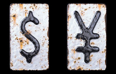 Set of symbols dollar and yen made of forged metal on the background fragment of a metal surface with cracked rust.