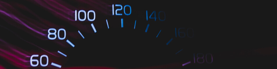 Driver's cockpit ; speedometer on dashboard - colorful light in black, copy space for your design