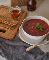 Vegan red soup in white plate