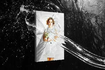 Canvas print with gallery wrap technique, water splash, drops on black background. Photo attached...