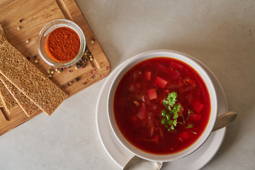 Vegan red soup in white plate