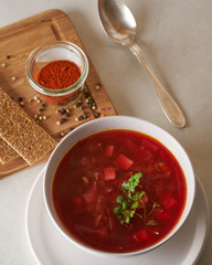 Vegan red soup in white plate