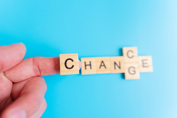 Wooden cube with word change to chance, Personal development and career growth or change yourself concept.