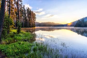 Sunrise at Shiroka polyana dam, West Rhodope mountains, Bulgaria