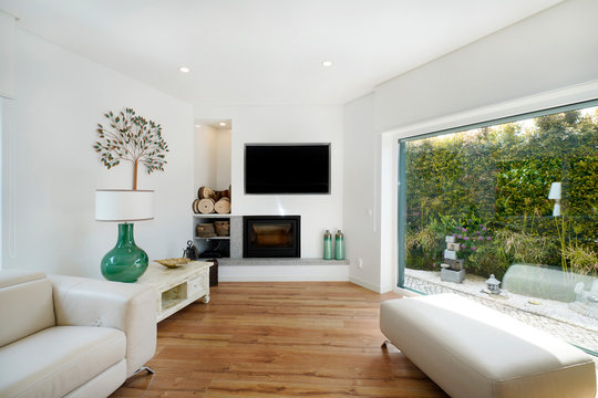 Home interior, modern contemporary furniture room. Fireplace modern.