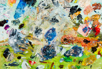 Close up of oil painting texture with brush strokes and palette knife strokes..Texture mixed oil paints in different colors and saturation. Art palette background..Abstract oil painting on canvas.