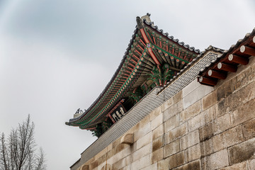 Roof of a beautiful Korean Pagoda in Seoul Park against the sky. Bottom view. Close-up.