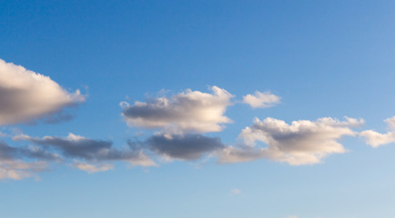 white clouds against blue sky