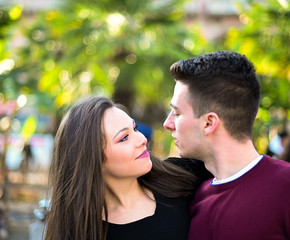 Fototapeta premium Young couple looking at each other deeply in the eyes