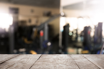 Empty wooden surface in modern gym interior