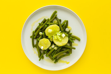 Healthy green beans with potatoes, paprika and onions