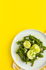 Healthy green beans with potatoes, paprika and onions