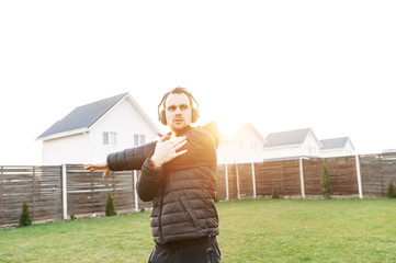 A guy doing workout in the backyard