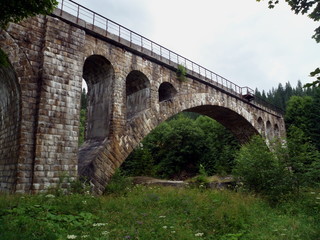 Fototapeta na wymiar Beautiful stone historic viaduct
