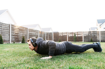 A guy doing workout in the backyard
