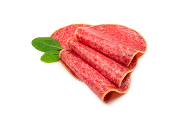Salami slices isolated on white background.