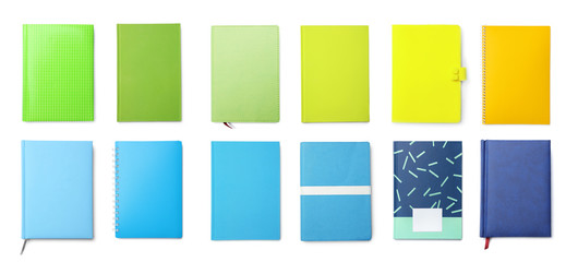 Set of different notebooks on white background, top view. Banner design