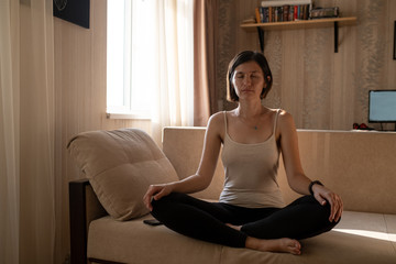 Young woman isolating at home and relaxing