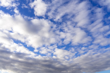 blue sky with beautiful contrasting clouds, perspective