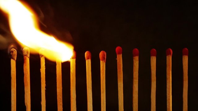 Chain of matches ignite one match after another until breaking the chain of fire