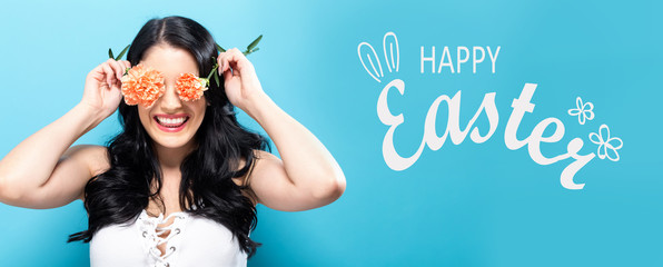 Happy Easter message with young woman holding carnation flowers