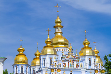 Fototapeta na wymiar Domes of St. Michael's Cathedral in Kyiv