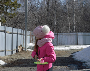  girl holding badminton racket in the hands