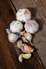 Garlic on a wooden background. Food on table.