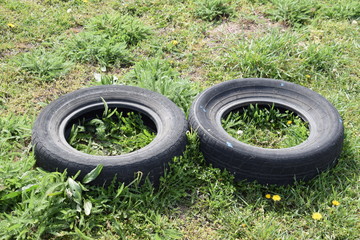 Kherson, Ukraine, 03/26/2020. Stands for evidence in the garden of car tires.