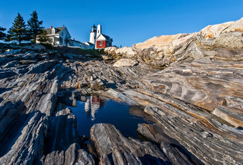 Pemaquid Point Lighthouse With Reflection In Pool on Granite Shoreline, Bristol, Maine, USA