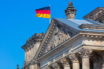 Berlin Reichstag with waving german flag, german politic democracy government building germany...