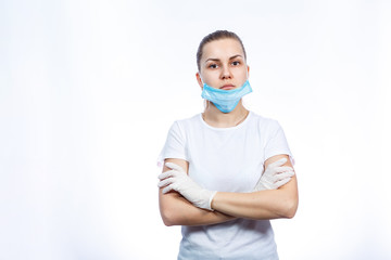 woman health worker in protective medical surgical mask against the virus. Isolated on white background