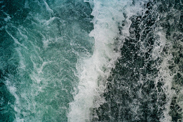 Seething atlantic sea water with foam, jet, stream Cape Cod