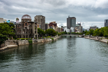 Fototapeta na wymiar A-Bomb Dome at Hiroshima Peace Memorial Park seen from Aioi bridge, Japan