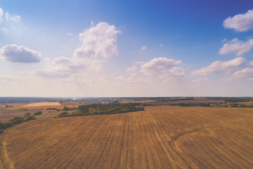 Spring rural landscape, aerial view. View of plowed fields with beautiful sky