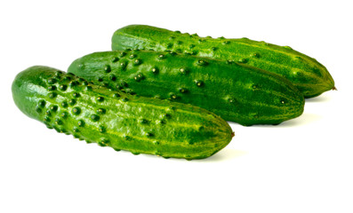 Image of fresh cucumbers isolated on a white background.