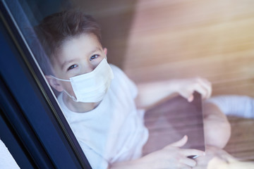 Little boy at home quarantine during coronavirus pandemic