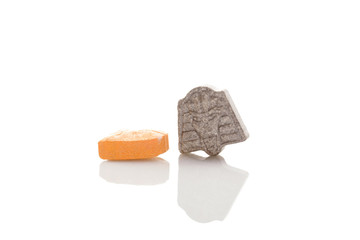 Ecstasy pills isolated on white background.