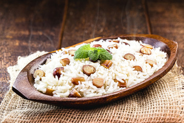 rice with pine nuts, typical Brazilian food during the winter. Meal made with pinaceaes and araucariaceaes, served hot. IN Brazil it is called 