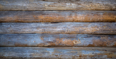 Obraz premium Wooden background. Old wooden wall of a rustic house with texture