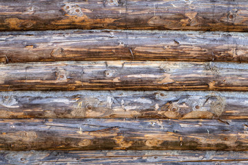 Plakat Wooden background. Old wooden wall of a rustic house with texture