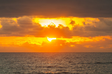 Magical dramatic sunset on a tropical beach.