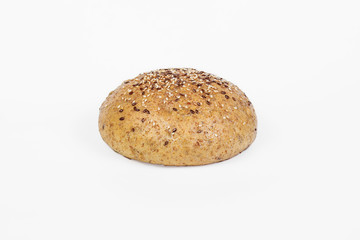 Fresh bakery product. Bread. Sesame seedless yeast isolated on white background. Top view and copy...